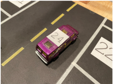 Car with number on roof